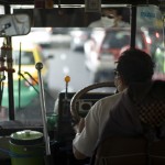 Bus driver in heavy Bangkok traffic